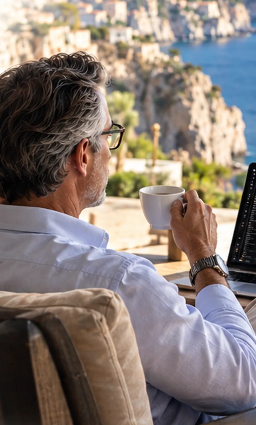 Experienced radiologist in a coastal international setting reviewing medical imaging.