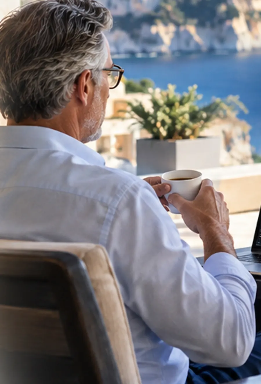 Experienced radiologist in a coastal international setting reviewing medical imaging.